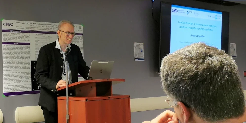 Dr. Hanns Lochmuller delivering a presentation